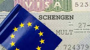 Schengen visa documents and European landmarks